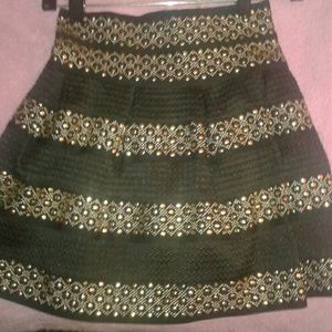 Black and gold mini skirt